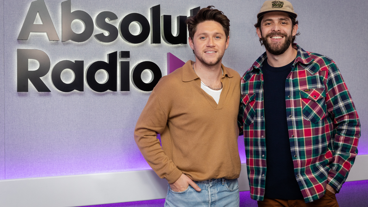LONDON, ENGLAND - MARCH 07: Thomas Rhett (R) poses with Niall Horan as he visits Bauer Media at 1 Golden Square on March 7, 2023 in London, England. (Photo by Tristan Fewings/Getty Images for Bauer Media)