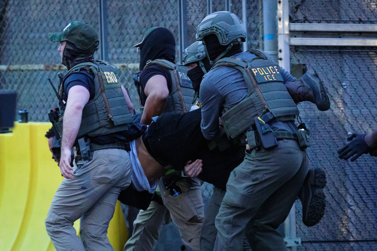  Federal agents detain a protestor outside the federal immigration center at Delaney Hall in Newark, where ICE is housing detained immigrants on May 26, 2026 in Newark, New Jersey. 