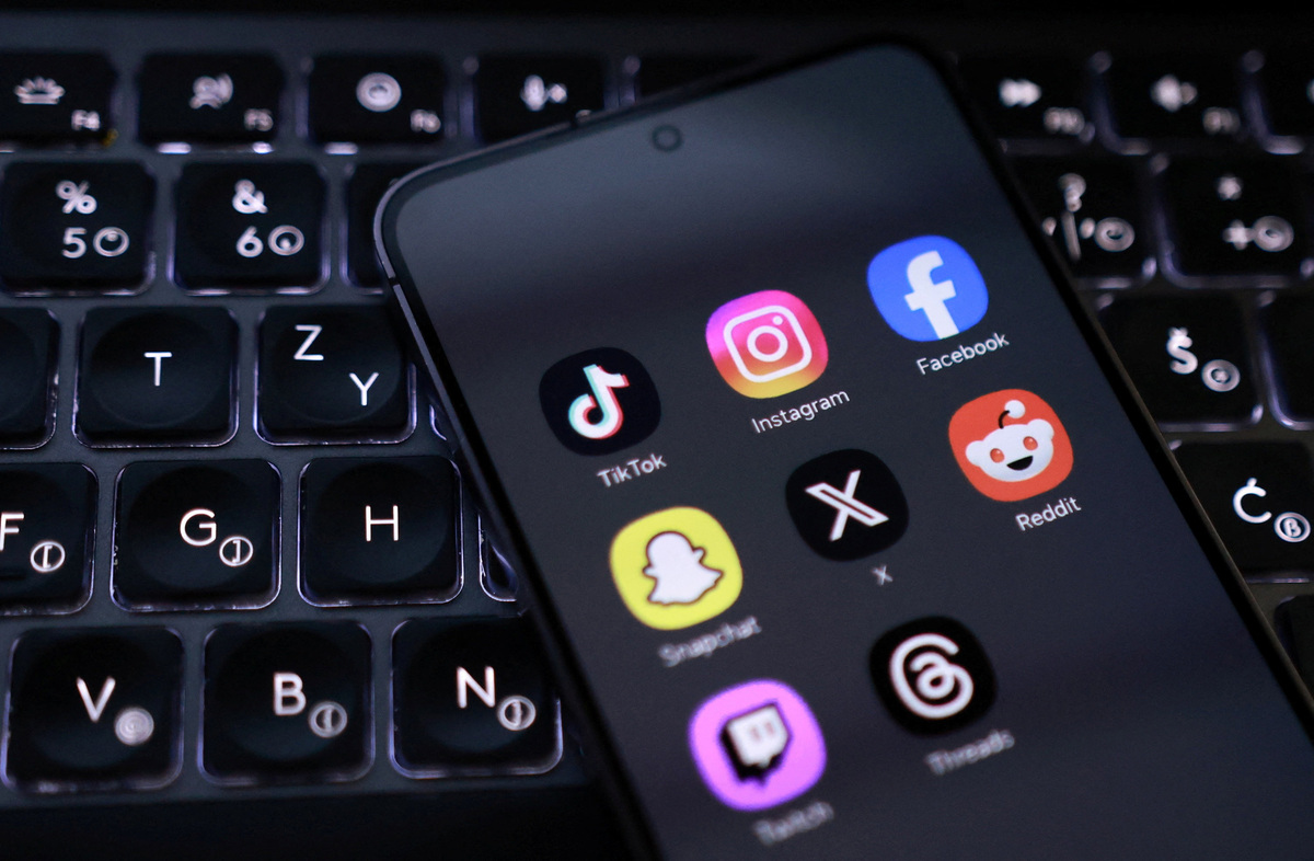 A smartphone with displayed social app icons in this illustration taken February 3, 2026. REUTERS/Dado Ruvic/Illustration