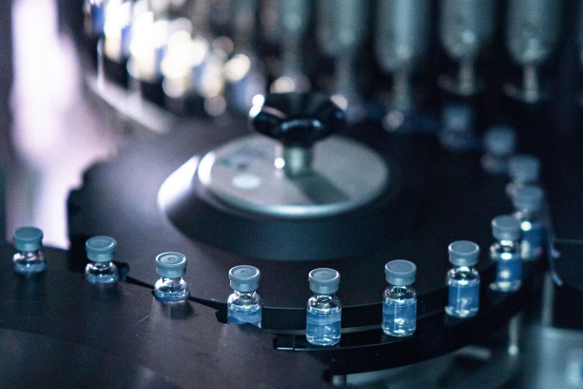 This August 2022 photo provided by Pfizer shows vials of the company’s updated bivalent COVID-19 vaccine during production in Kalamazoo, Mich. U.S. regulators have authorized updated COVID-19 boosters, the first to directly target today’s most common omicron strain.