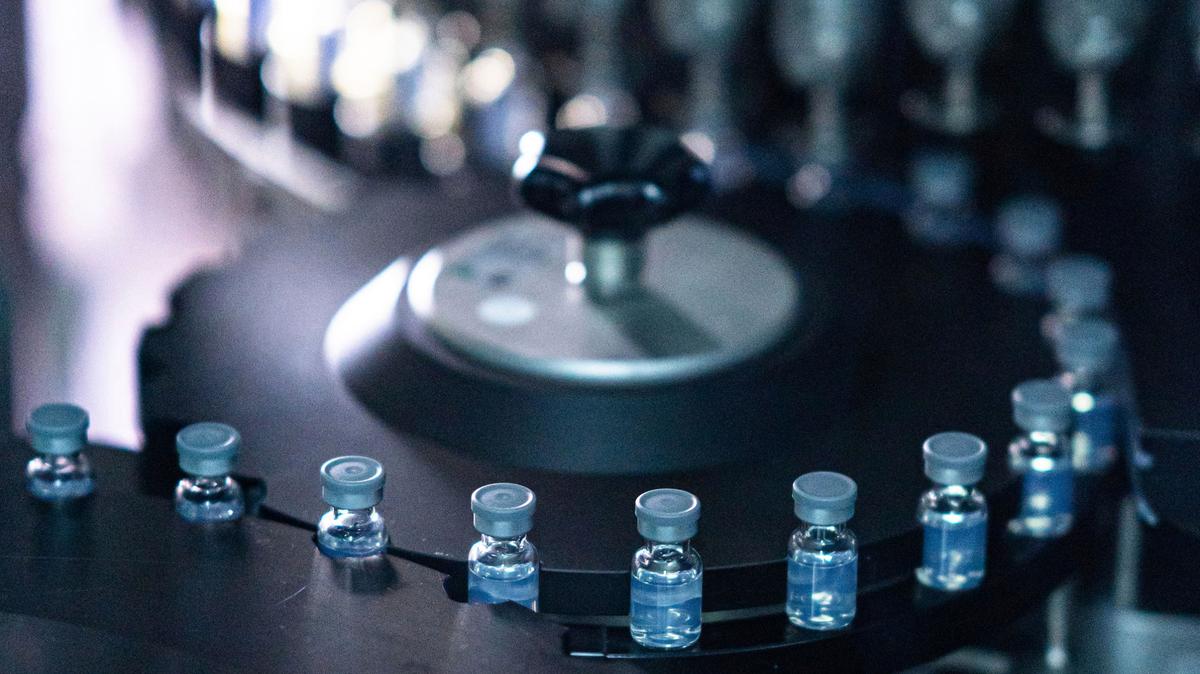 This August 2022 photo provided by Pfizer shows vials of the company’s updated bivalent COVID-19 vaccine during production in Kalamazoo, Mich. U.S. regulators have authorized updated COVID-19 boosters, the first to directly target today’s most common omicron strain.