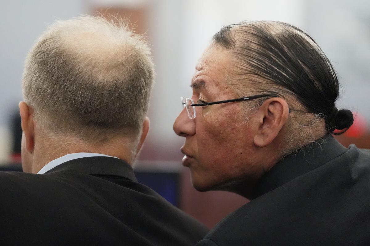  FILE – Nathan Chasing Horse, right, talks to his attorney Craig Mueller during his trial on charges of sexually abusing Indigenous women and girls, Jan. 13, 2026, in Las Vegas. (AP Photo/Ty ONeil, file) 