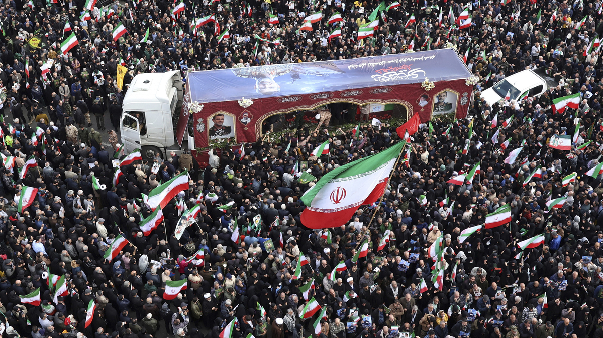 Iranians attend the funeral of Alireza Tangsiri, commander of the Iranian Revolutionary Guards' navy, alongside others killed in US-Israeli strikes on Iran at Enghelab Square in Tehran on April 1, 2026. Iran confirmed on March 30 that an Israeli strike had killed the commander of the naval force of the Revolutionary Guards, who Israel had said was responsible for the blocking of the Strait of Hormuz. A statement carried by the Guards' Sepah News website said Alireza Tangsiri "succumbed to severe injuries" from the attack last week. (AFP via Getty Images/TNS)