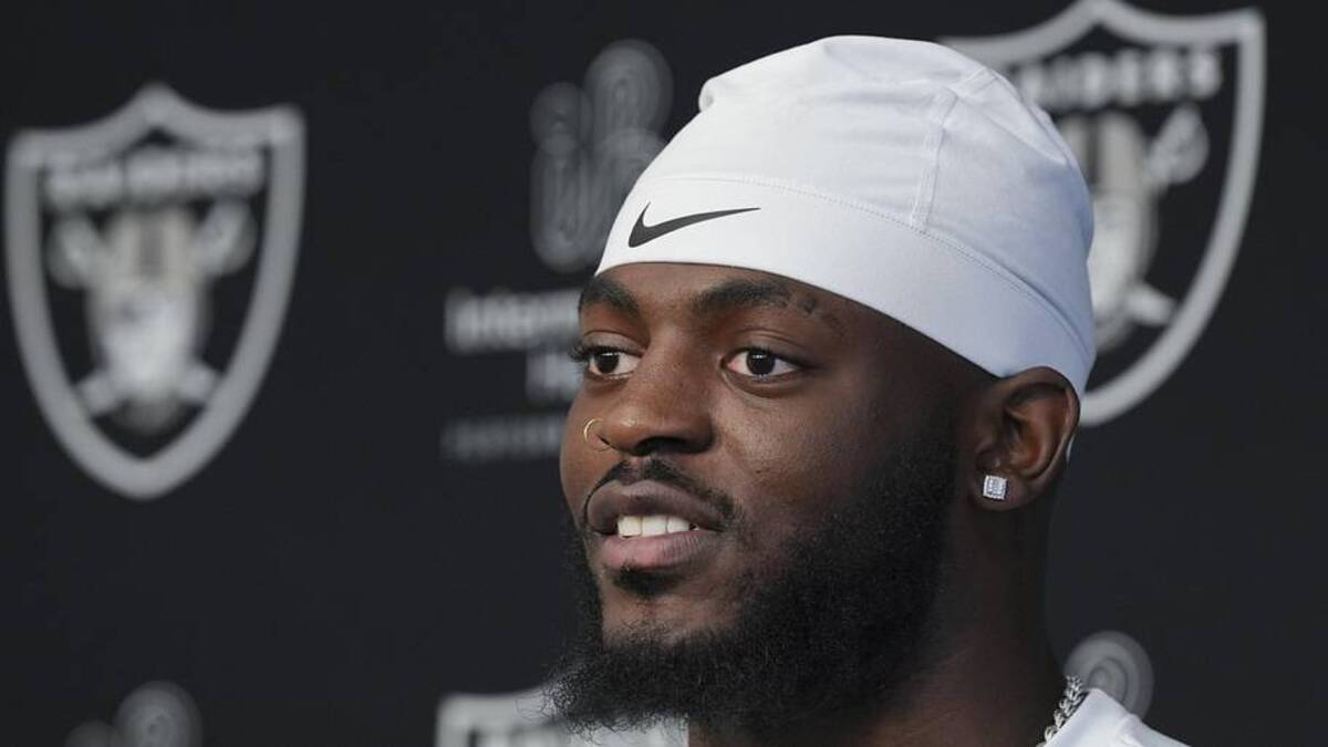  May 2, 2026; Henderson, NV, USA; Las Vegas Raiders defensive end Keyron Crawford (42) speaks during a news conference at the team's Rookie Minicamp at Intermountain Health Performance Center. Mandatory Credit: Candice Ward-Imagn Images | Candice Ward-Imagn Images 