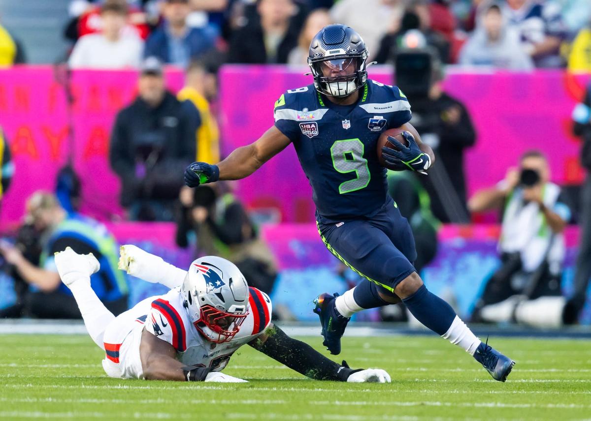  Seattle Seahawks running back Kenneth Walker III eludes New England Patriots defensive end Milton Williams during Super Bowl LX at Levi's Stadium on Feb. 8, 2026. Mark J. Rebilas-Imagn Images