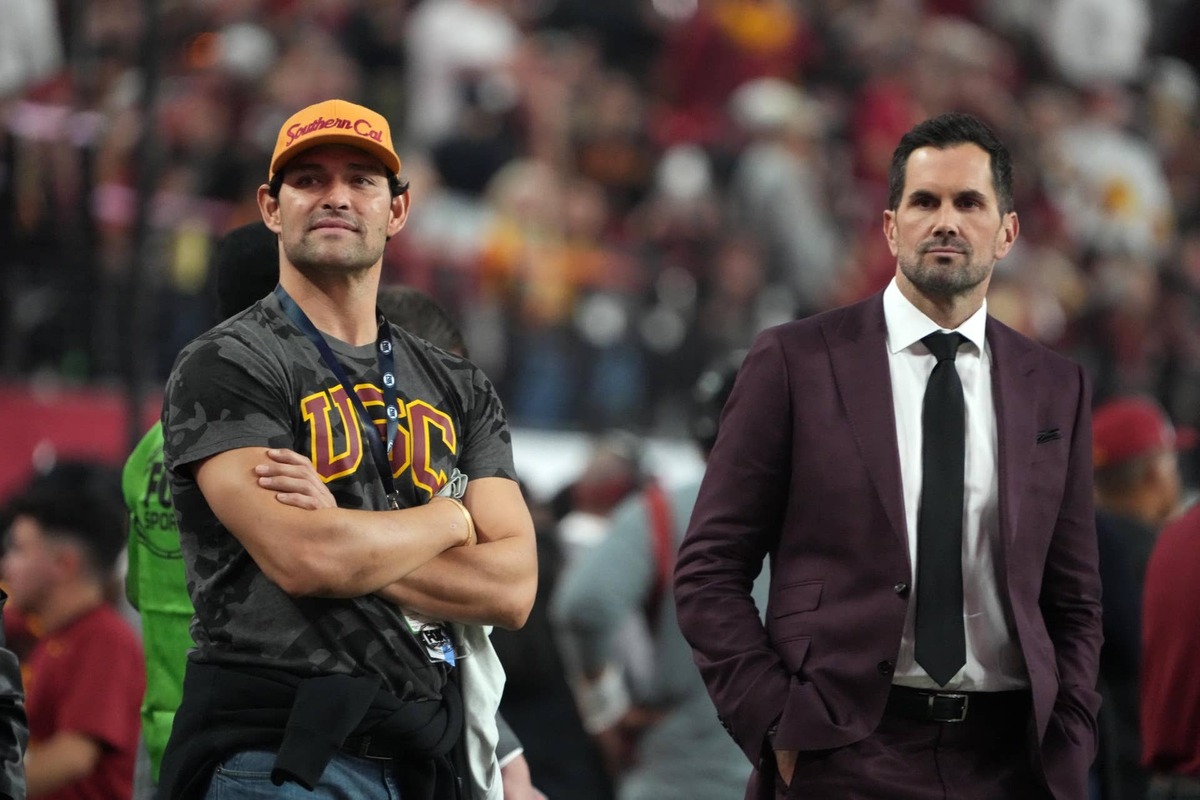  Dec 2, 2022; Las Vegas, NV, USA; Southern California Trojans former quarterbacks Mark Sanchez (left) and Matt Leinart watch from the sidelines during the Pac-12 Championship game against the Utah Utes at Allegiant Stadium. Mandatory Credit: Kirby Lee-USA TODAY Sports 