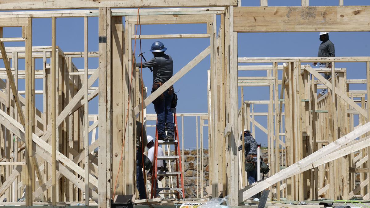 Construction workers frame new houses in 2024 in Crandall, Texas. (Chitose Suzuki/Dallas Morning News/TNS)