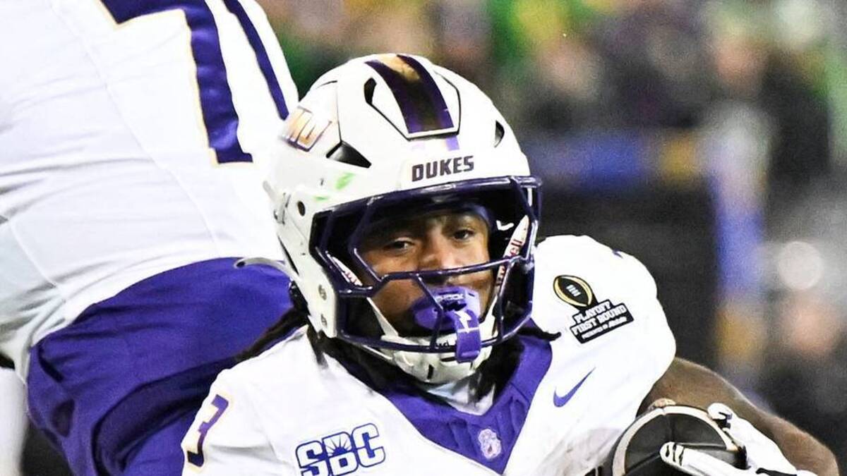  Dec 20, 2025; Eugene, OR, USA; James Madison Dukes running back Wayne Knight (3) rushes during the third quarter against the Oregon Ducks at Autzen Stadium. Mandatory Credit: Craig Strobeck-Imagn Images | IMAGN IMAGES via Reuters Connect 
