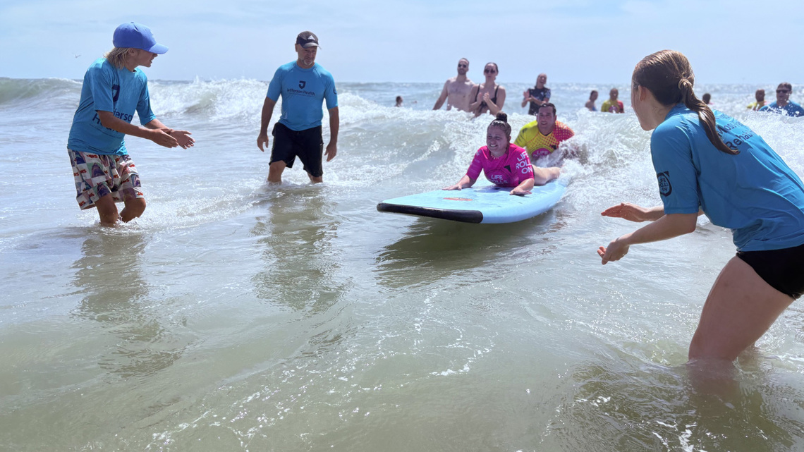 A stray bullet paralyzed a Philly woman from the waist down. Now she surfs, teaches, and advocates for accessibility