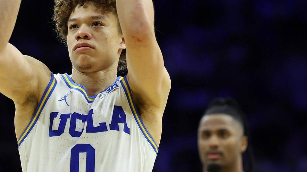  Mar 20, 2026; Philadelphia, PA, USA; UCLA Bruins guard Trent Perry (0) shoots the ball in the second half during a first round game of the men's 2026 NCAA Tournament at Xfinity Mobile Arena. Mandatory Credit: Bill Streicher-Imagn Images | Bill Streicher-Imagn Images 