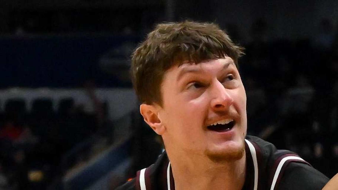  Mar 11, 2026; Nashville, TN, USA; Auburn Tigers guard Keyshawn Hall (7) strips the ball from Mississippi State Bulldogs forward Sergej Macura (11) during the second half at Bridgestone Arena. Mandatory Credit: Steve Roberts-Imagn Images | Steve Roberts-Imagn Images 