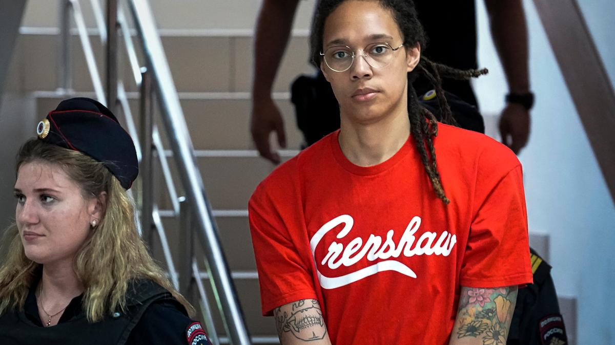 WNBA star and two-time Olympic gold medalist Brittney Griner is escorted to a courtroom for a hearing, in Khimki just outside Moscow, Russia, Thursday, July 7, 2022. Griner pleaded guilty Thursday to drug possession charges on the second day of her trial in a Russian court in a case that could see her sentenced to up to 10 years in prison. (AP Photo/Alexander Zemlianichenko)