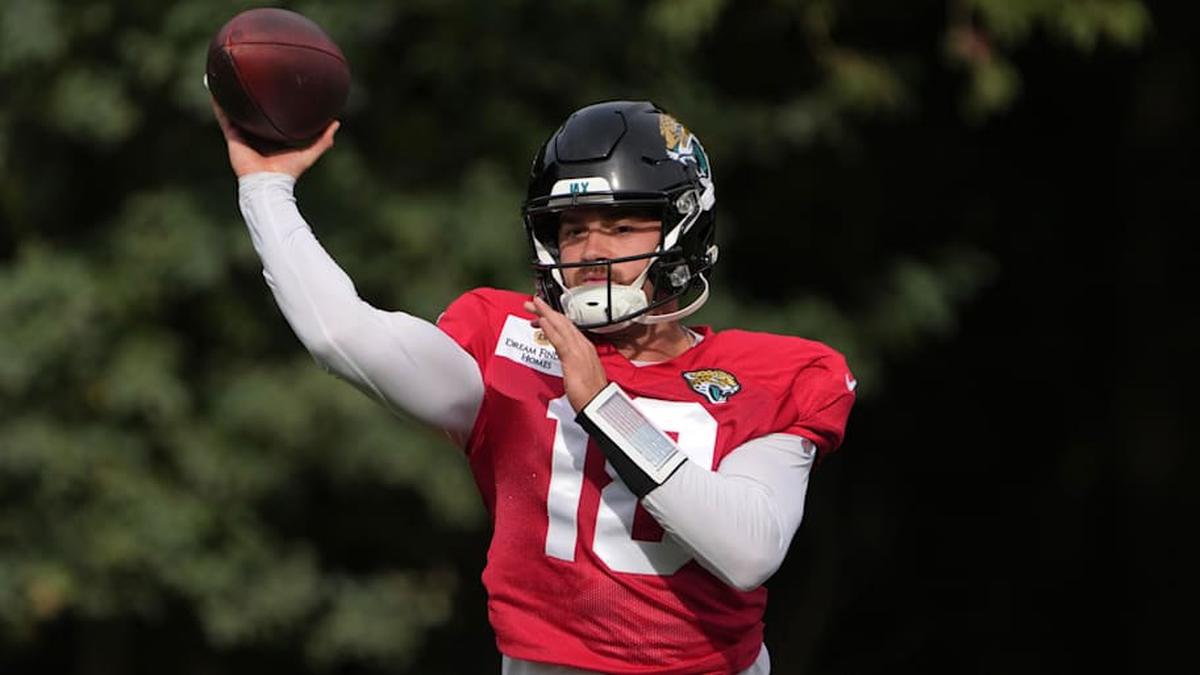  Oct 17, 2024; Watford, United Kingdom; Jacksonville Jaguars quarterback John Rhys Plumlee (18) throws the ball during practice at The Grove. Mandatory Credit: Kirby Lee-Imagn Images | Kirby Lee-Imagn Images 