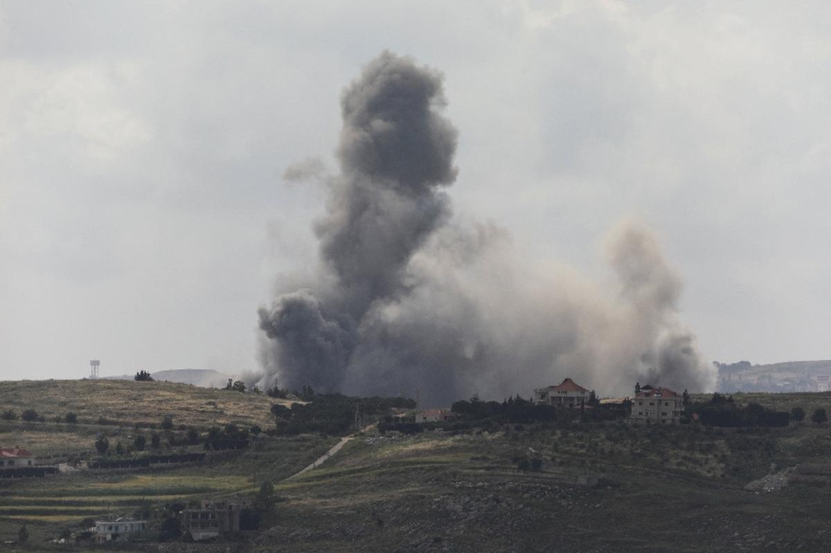 Smoke billows from southern Lebanon following an Israeli strike, as seen from Marjeyoun, Lebanon, May 15, 2026. REUTERS/Stringer