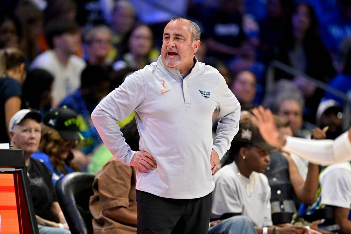  May 14, 2026; Arlington, Texas, USA; Dallas Wings head coach Jose Fernandez looks on during the first half against the Minnesota Lynx at College Park Center. Mandatory Credit: Jerome Miron-Imagn Images 