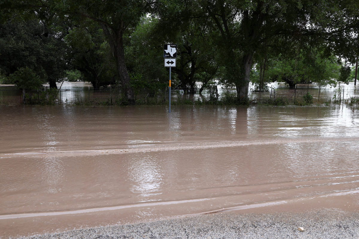 A road following heavy rains and severe weather in Stonewall, Texas, U.S., July 16, 2026. REUTERS/Kaylee Greenlee