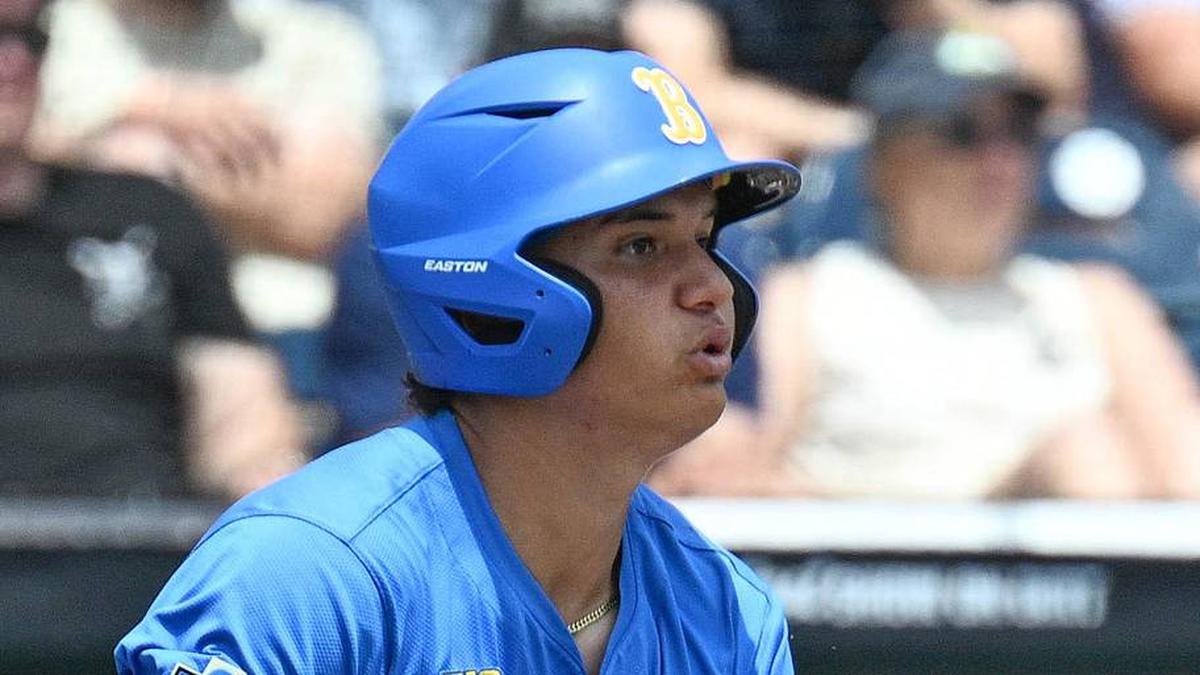  Jun 14, 2025; Omaha, Neb, USA; UCLA Bruins first baseman Mulivai Levu (39) singles against the Murray State Racers during the first inning at Charles Schwab Field. Mandatory Credit: Steven Branscombe-Imagn Images | Steven Branscombe-Imagn Images 