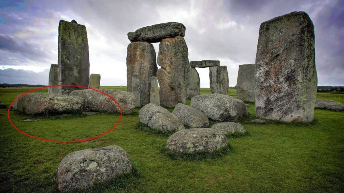 New information about Stonehenge's altar stone, circled in red, has been revealed. (Oli Scarff via SWNS). 
