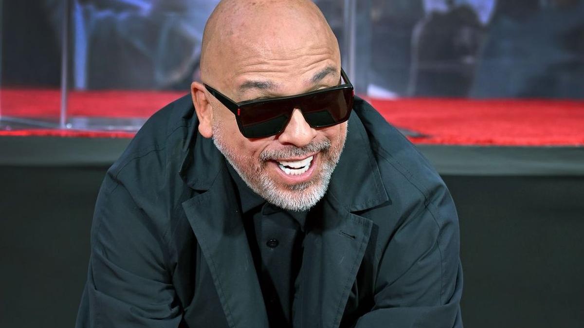 Jo Koy gets his hands on cement as he is honored with a hand and footprint ceremony in the forecourt of the TCL Chinese Theatre in Los Angeles on February 11. The comedian turns 55 on June 2. File Photo by Chris Chew/UPI