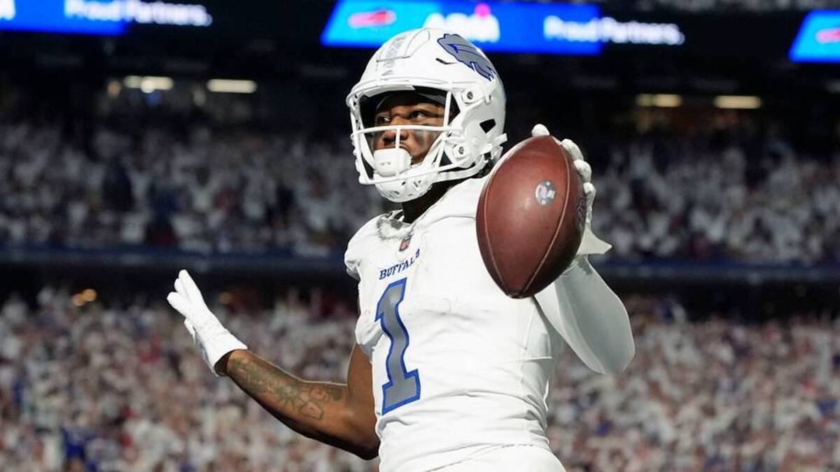  Oct 5, 2025; Orchard Park, New York, USA; Buffalo Bills wide receiver Curtis Samuel (1) scores a touchdown against the New England Patriots during the second half at Highmark Stadium. Mandatory Credit: Gregory Fisher-Imagn Images | IMAGN IMAGES via Reuters Connect 