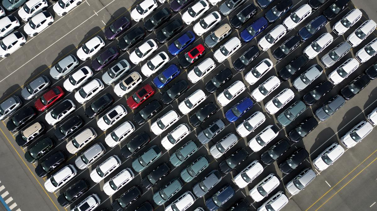 A drone view shows new cars parked, imported or waiting to be exported, in the port of Zeebrugge, Belgium, July 18, 2025. REUTERS/Yves Herman