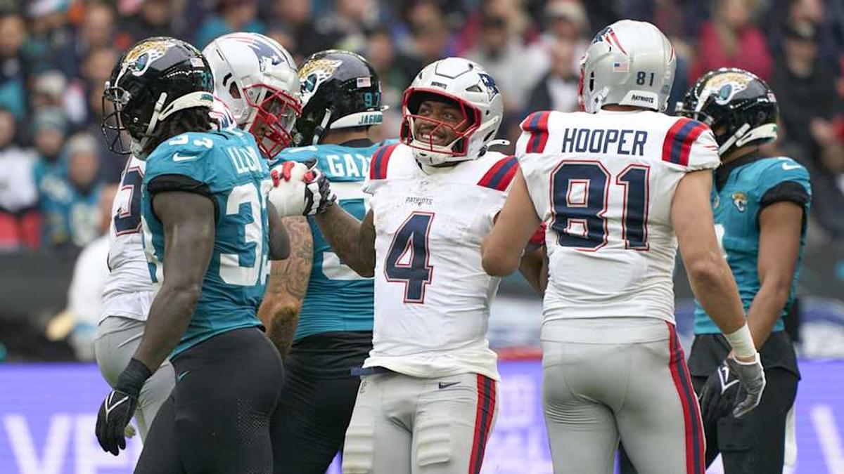  Oct 20, 2024; London, United Kingdom; New England Patriots running back Antonio Gibson (4) smiles after gaining yards in the first half during an NFL International Series game at Wembley Stadium. Mandatory Credit: Peter van den Berg-Imagn Images | Peter van den Berg-Imagn Images 