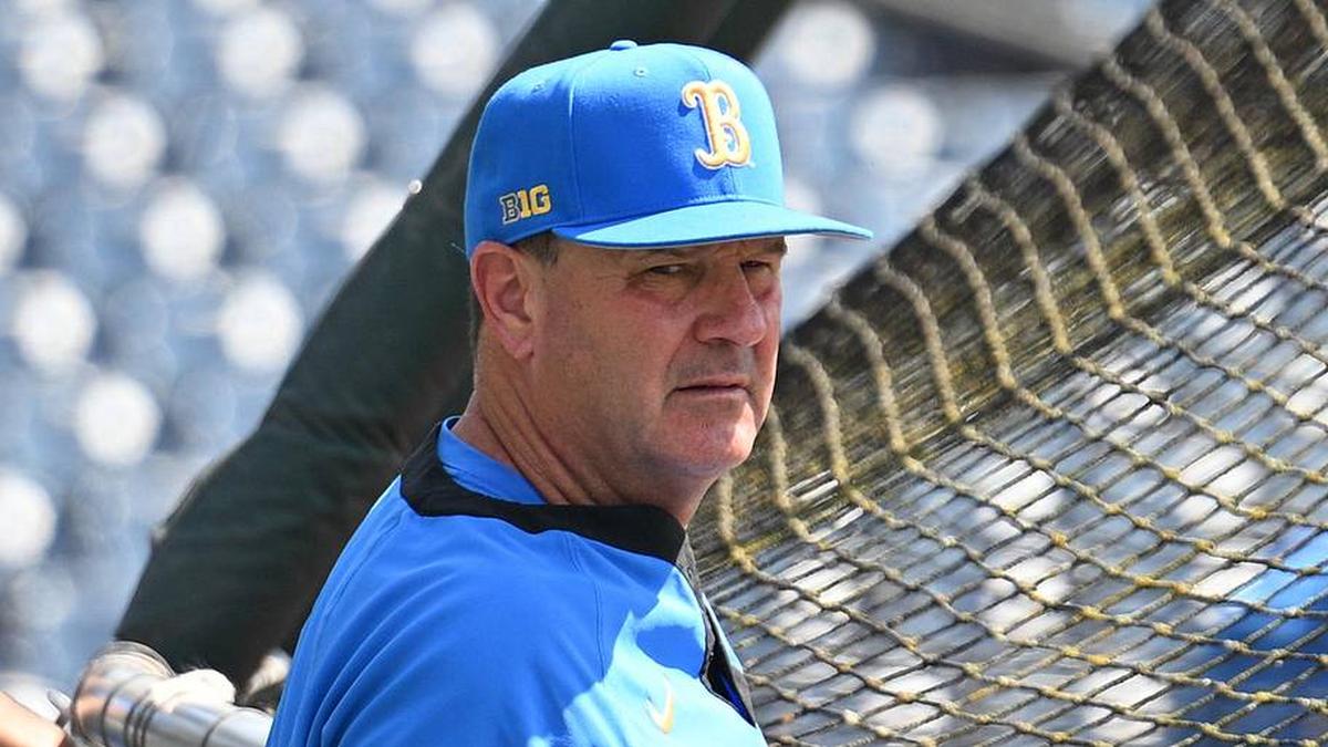  Jun 14, 2025; Omaha, Neb, USA; UCLA Bruins head coach John Savage watches the team warm up before the game against the Murray State Races at Charles Schwab Field. Mandatory Credit: Steven Branscombe-Imagn Images | Steven Branscombe-Imagn Images 
