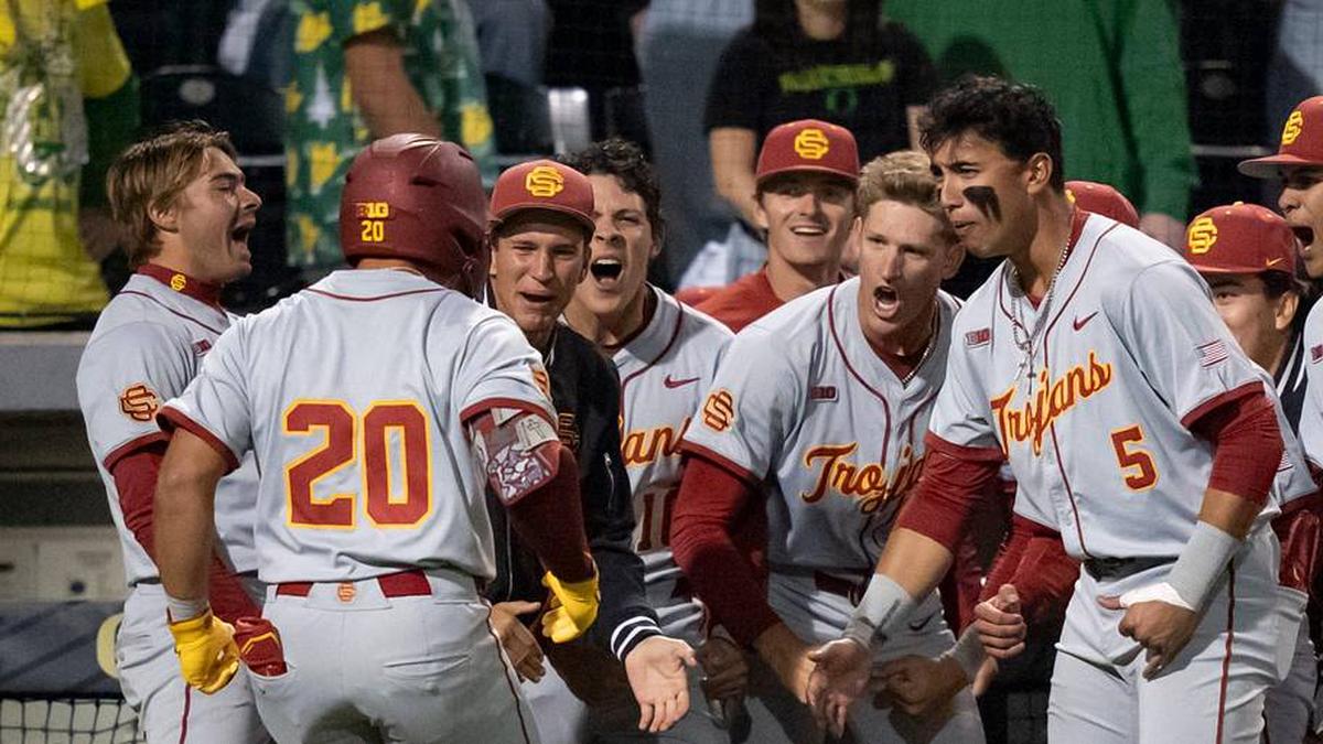  USC celebrates a home run by Isaac Cadena (20) as the Oregon Ducks host the USC Trojans on May 14, 2026, in Eugene, Oregon. | Ben Lonergan/The Register-Guard / USA TODAY NETWORK via Imagn Images 