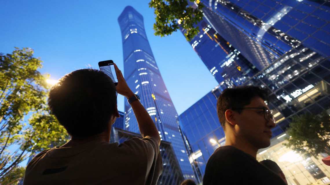 Small aircraft crashes into Beijing's tallest building, eyewitnesses say 