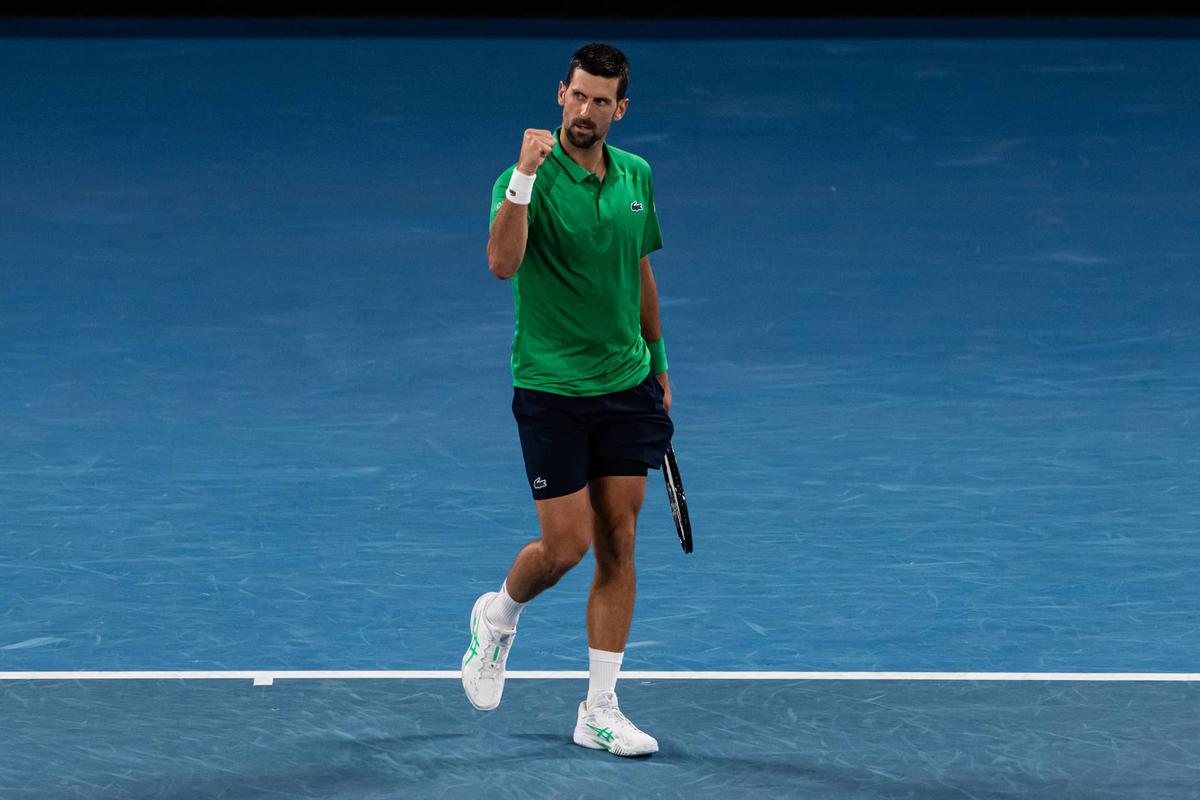  Jan 30, 2026; Melbourne, Victoria, Australia; Novak Djokovic of Serbia in action against Jannik Sinner of Italy in the semifinals of the men’s singles at the Australian Open at Rod Laver Arena in Melbourne Park. Mandatory Credit: Mike Frey-Imagn Images 