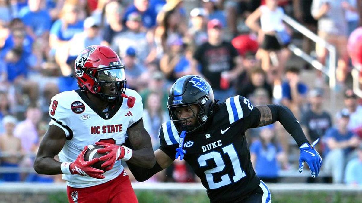  Sep 20, 2025; Durham, North Carolina, USA; North Carolina State Wolfpack wide receiver Terrell Anderson (9) runs the ball during the second quarter against Duke Blue Devils cornerback Landan Callahan (21) at Wallace Wade Stadium. Mandatory Credit: Zachary Taft-Imagn Images | Zachary Taft-Imagn Images 