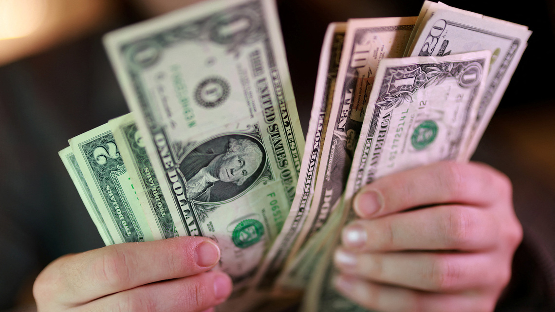Dollar steadies near two-week high as Middle East hostilities lift oil 