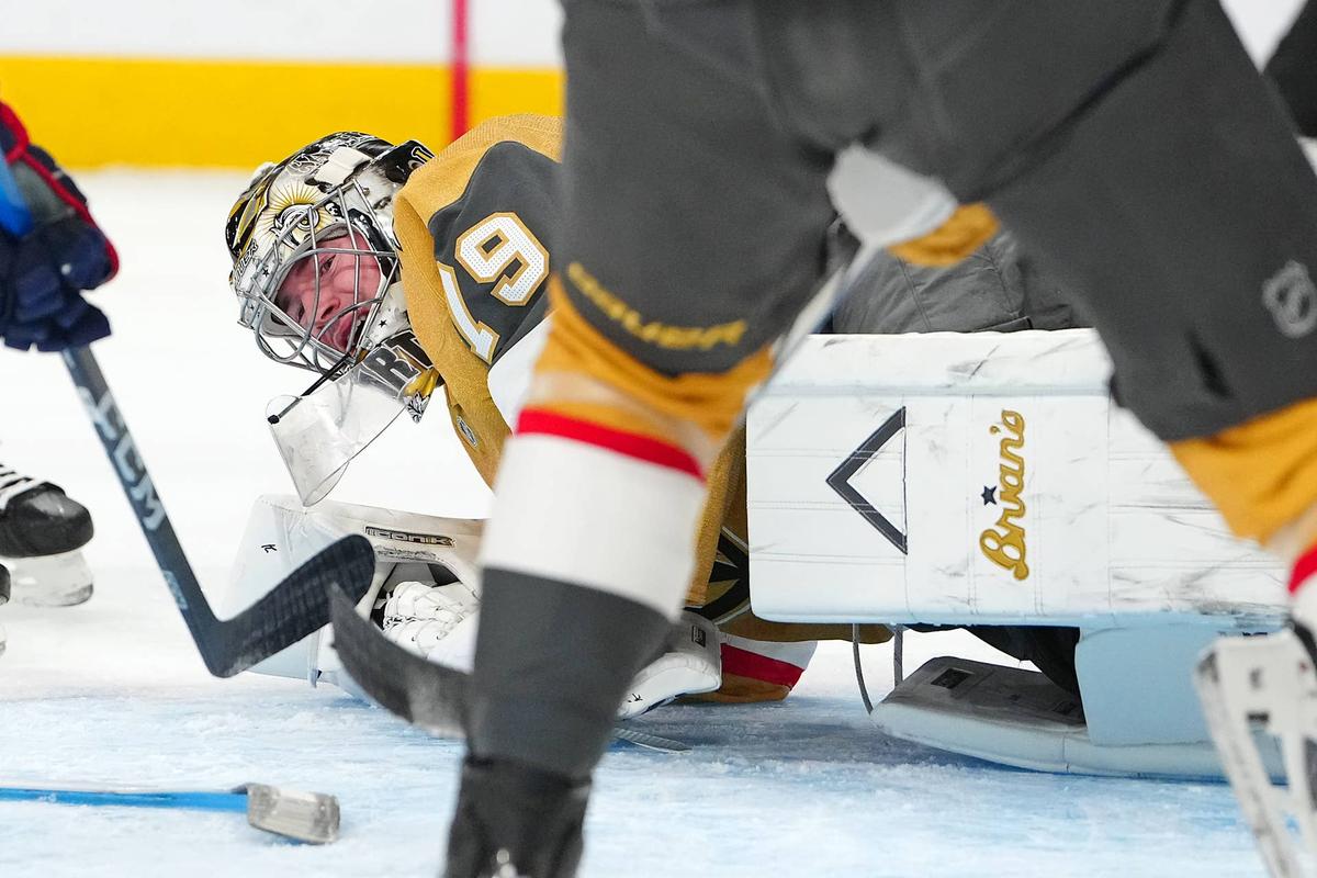  Vegas Golden Knights goaltender Carter Hart (79) attempts to defend his net. Stephen R. Sylvanie-Imagn Images