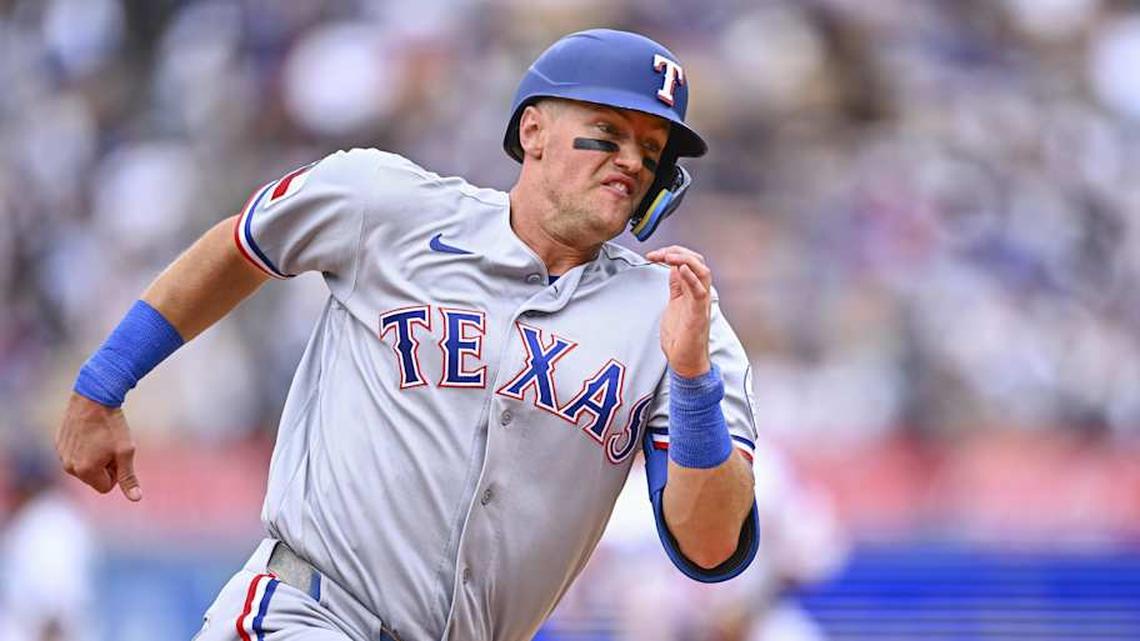  Texas Rangers third baseman Josh Jung (6) runs to home plate to score a run against the Los Angeles Dodgers during the eighth inning at Dodger Stadium. | Jonathan Hui-Imagn Images 