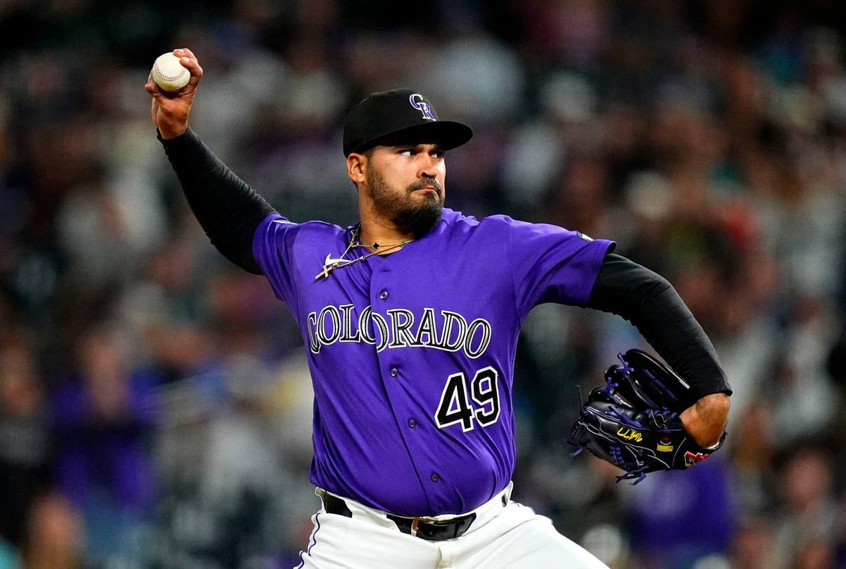  Apr 7, 2026; Denver, Colorado, USA; Colorado Rockies relief pitcher Antonio Senzatela (49) delivers a pitch in the ninth inning against the Houston Astros at Coors Field. Mandatory Credit: Ron Chenoy-Imagn Images Ron Chenoy-Imagn Images