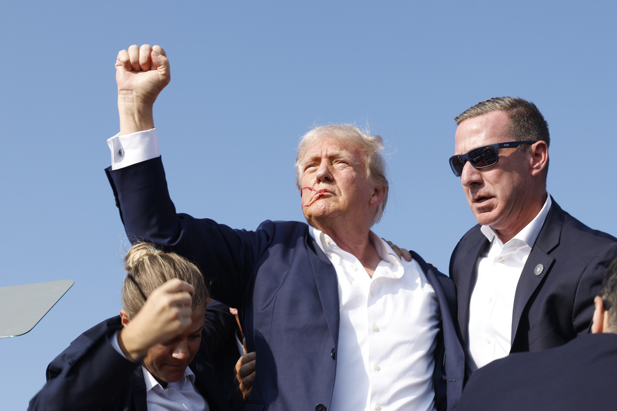 Donald Trump, who was then running for his second term, is rushed offstage during a rally on July 13, 2024, in Butler, Pennsylvania. (Anna Moneymaker/Getty Images) 