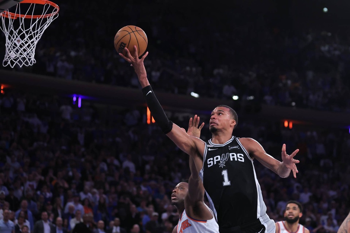  Jun 10, 2026; New York, New York, USA; San Antonio Spurs forward Victor Wembanyama (1) shoots against New York Knicks forward Og Anunoby (8) in the fourth quarter during game four of the 2026 NBA Finals at Madison Square Garden. Mandatory Credit: Brad Penner-Imagn Images 