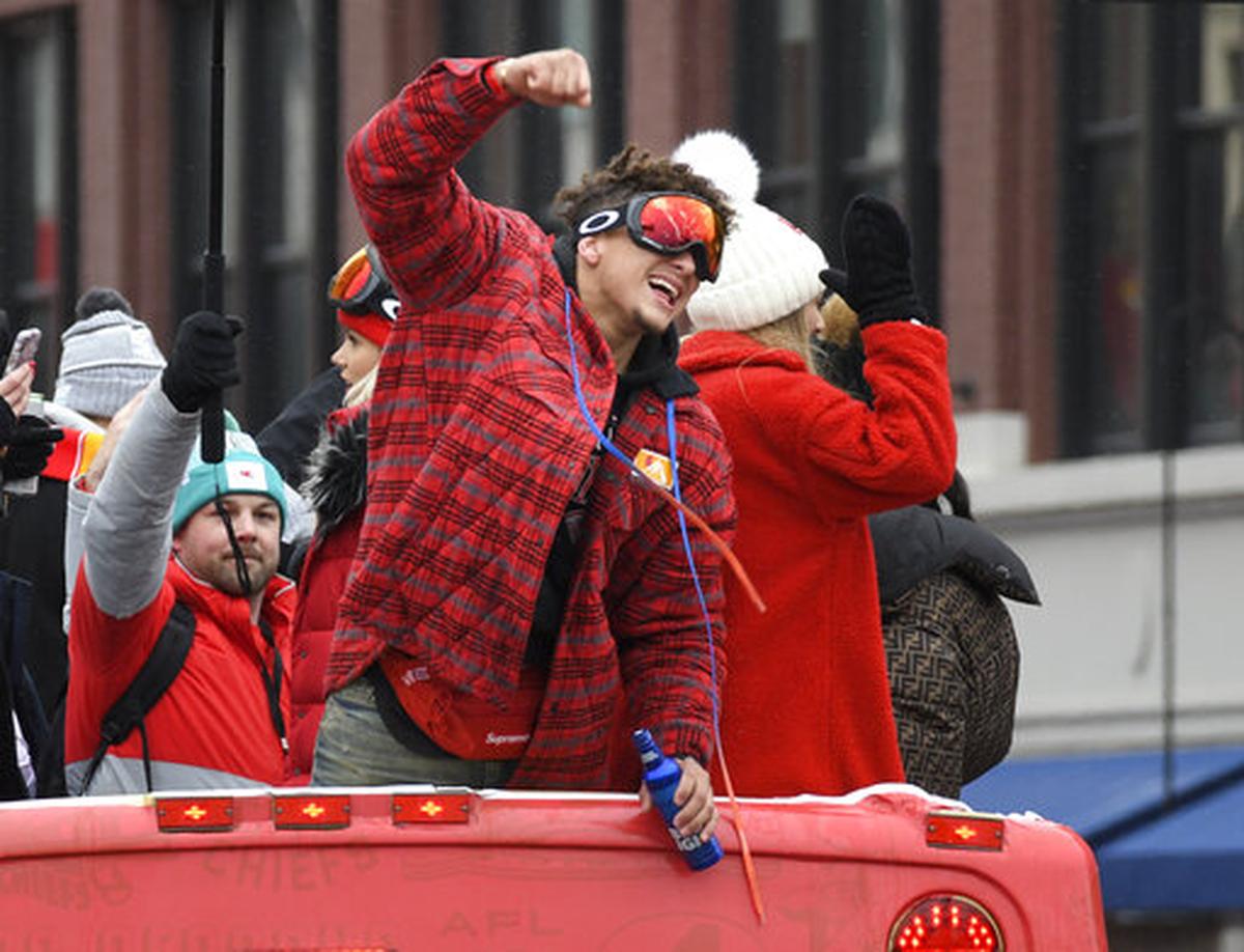 Kansas City Chiefs quarterback Patrick Mahomes cheered with the crowd during the Super Bowl parade downtown on Feb. 5.