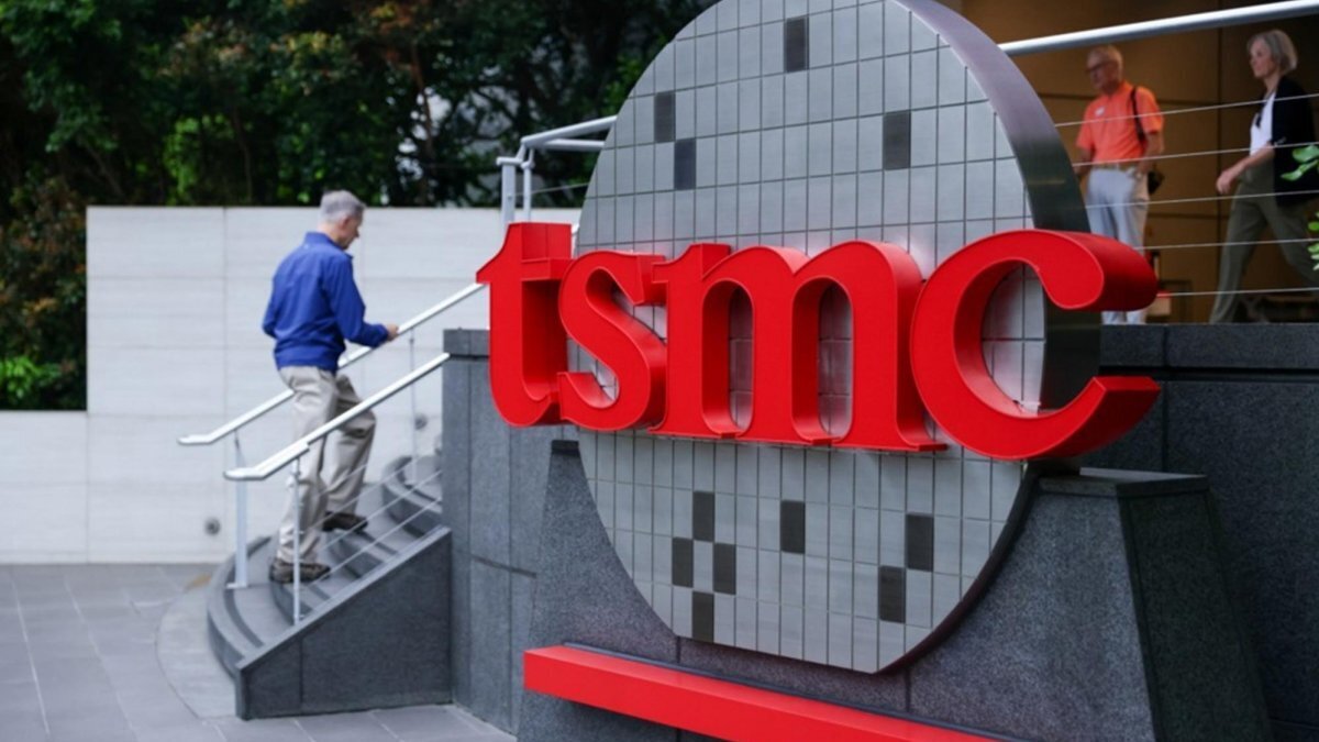 A person walks past the logo of TSMC or Taiwan Semiconductor Manufacturing Company Limited outside of its office building in Hsinchu, Taiwan, 16 April 2026. Photo by RITCHIE B. TONGO / EPA