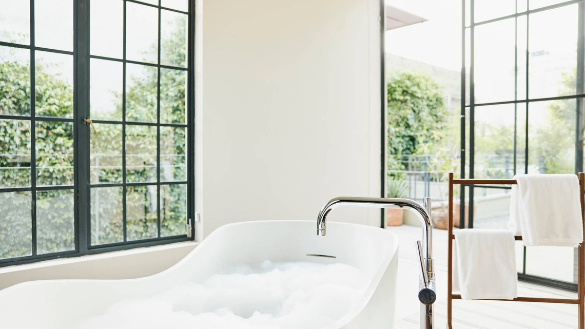 Designers Say All-White Bathrooms Are Starting to Feel Sterile-Here's the Richer, Moodier Look Their Clients Want Instead 
