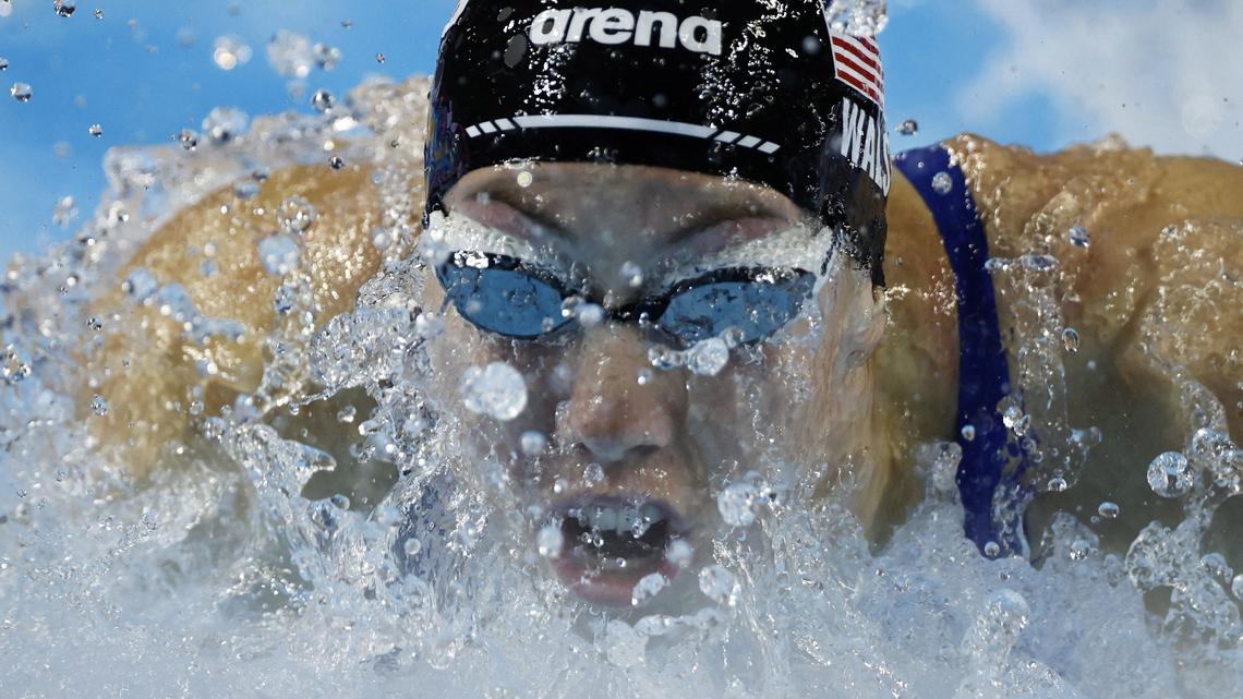 Swimming-American Walsh improves own 100m butterfly world record for third time in a year 