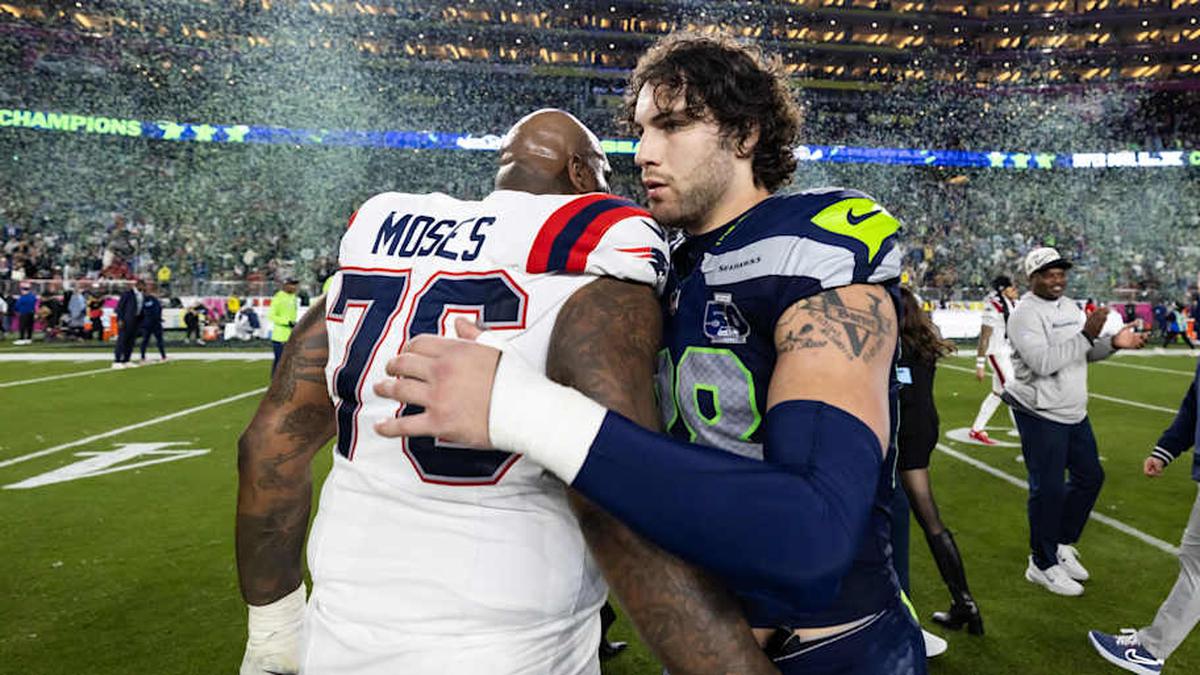  Feb 8, 2026; Santa Clara, CA, USA; Seattle Seahawks tight end AJ Barner (88) greets New England Patriots offensive tackle Morgan Moses (76) following Super Bowl LX at Levi's Stadium. Mandatory Credit: Mark J. Rebilas-Imagn Images | Mark J. Rebilas-Imagn Images 