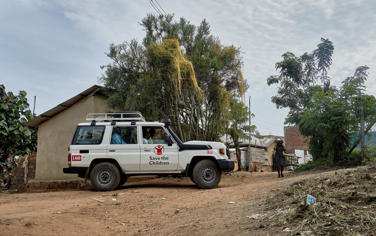 A 'Save the Children' vehicle leaves the Centre Medical Evangelique (CME), as aid agencies intensify efforts to contain the Ebola outbreak involving the Bundibugyo strain, in Hoho commune of Bunia town, Ituri province, Democratic Republic of Congo, June 9, 2026. REUTERS/Gradel Muyisa Mumbere