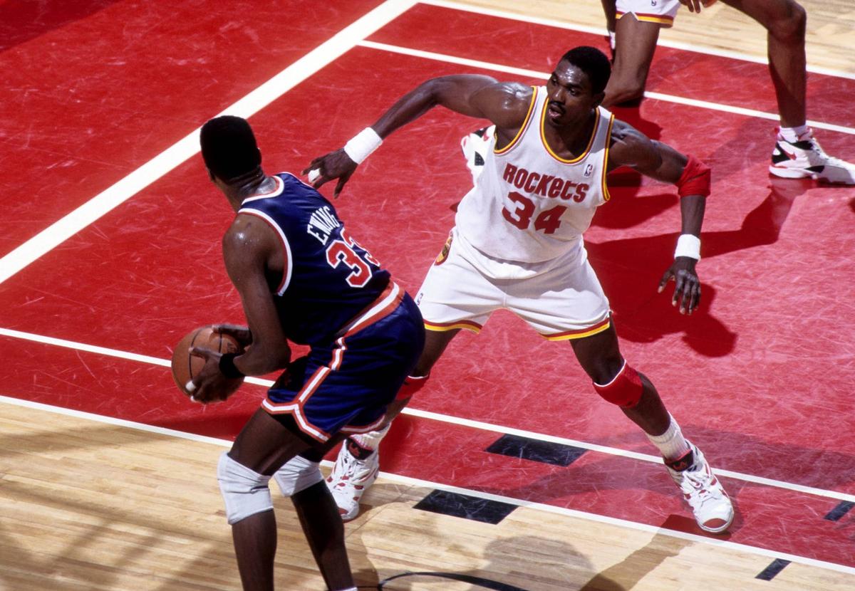  Houston Rockets center Hakeem Olajuwon defends New York Knicks center Patrick Ewing during the 1994 NBA Finals at the Summit. MPS-USA TODAY Sports
