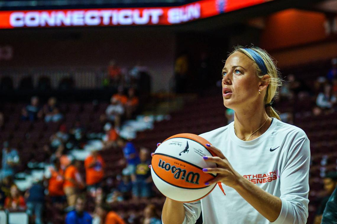  Indiana Fever guard Sophie Cunningham (8) warms up before the start of the game against the Connecticut Sun. David Butler II-Imagn Images