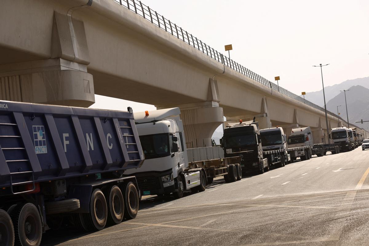 Trucks make their way into the Port of Fujairah, as the U.S.-Israel conflict with Iran limits marine traffic in the Strait of Hormuz, in Fujairah, United Arab Emirates, May 6, 2026. REUTERS/Amr Alfiky
