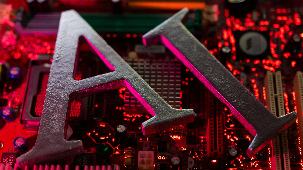 AI (Artificial Intelligence) letters are placed on computer motherboard in this illustration taken, June 23, 2023. REUTERS/Dado Ruvic/Illustration