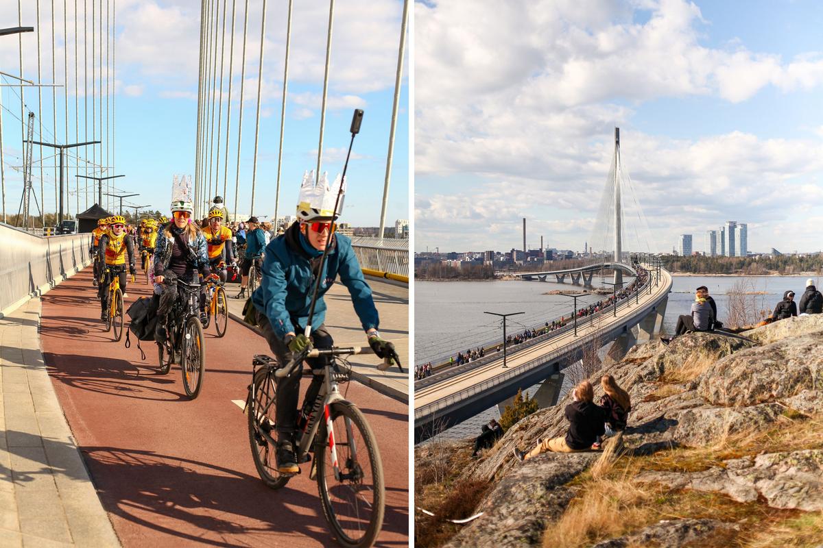  Cyclists and onlookers are pictured on the opening day of the Kruunuvuori Bridge in Helsinki, the Finnish capital. 