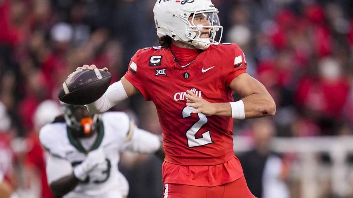  Oct 25, 2025; Cincinnati, Ohio, USA; Cincinnati Bearcats quarterback Brendan Sorsby (2) drops back to pass against the Baylor Bears in the second half at Nippert Stadium. Mandatory Credit: Aaron Doster-Imagn Images | Aaron Doster-Imagn Images 