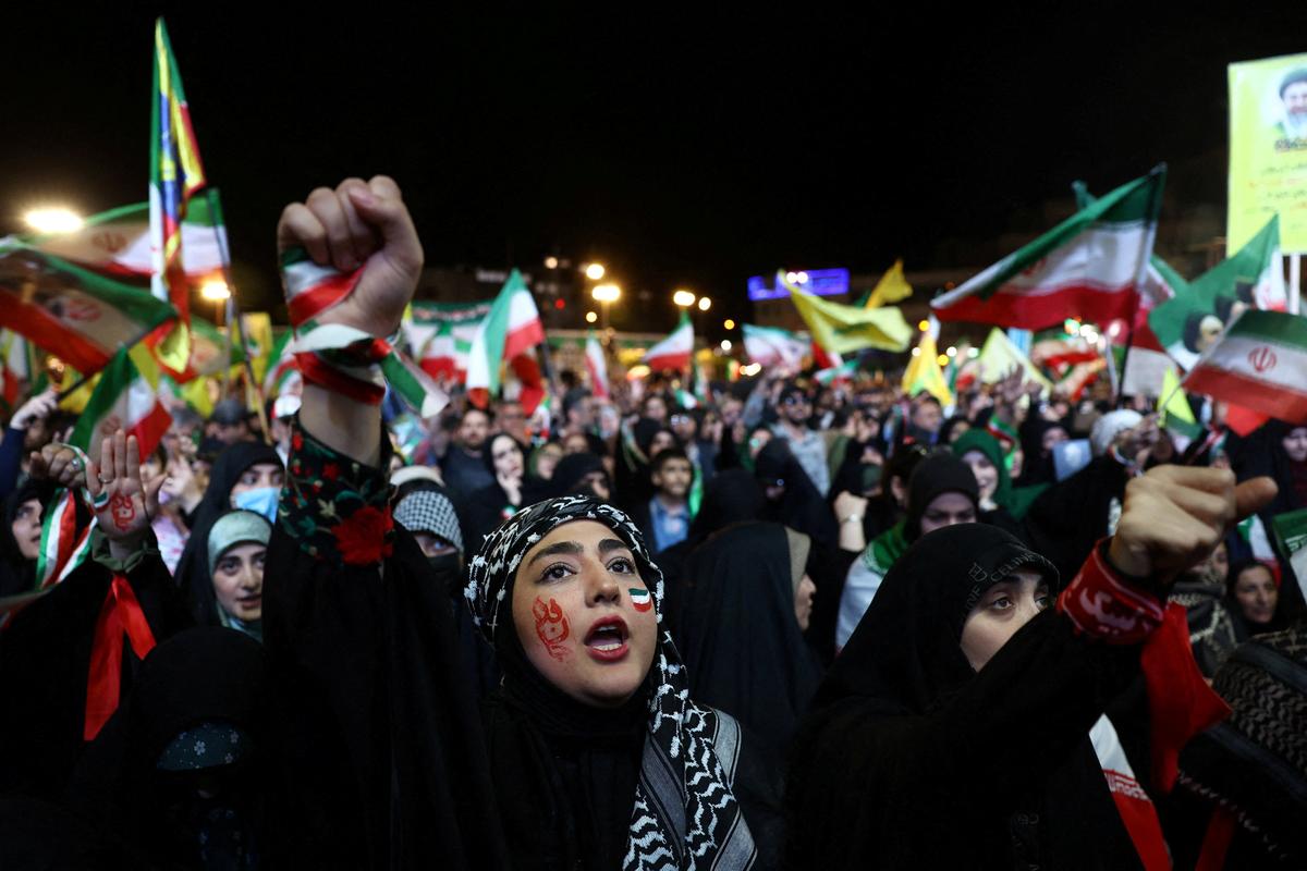People chant during a rally in Tehran, Iran, May 6, 2026. Majid Asgaripour/WANA (West Asia News Agency) via REUTERS